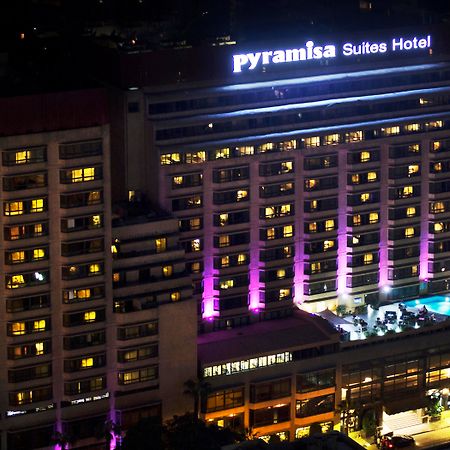 Pyramisa Suites Hotel Cairo Giza Zewnętrze zdjęcie The hotel at night