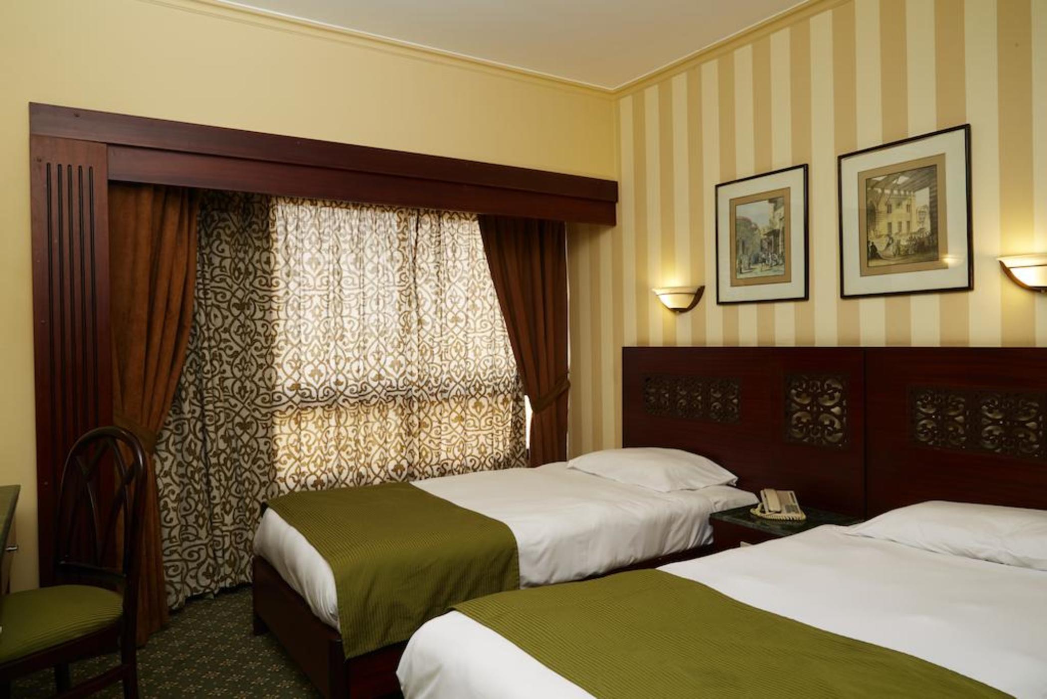 Pyramisa Suites Hotel Cairo Giza Zewnętrze zdjęcie A room at the hotel