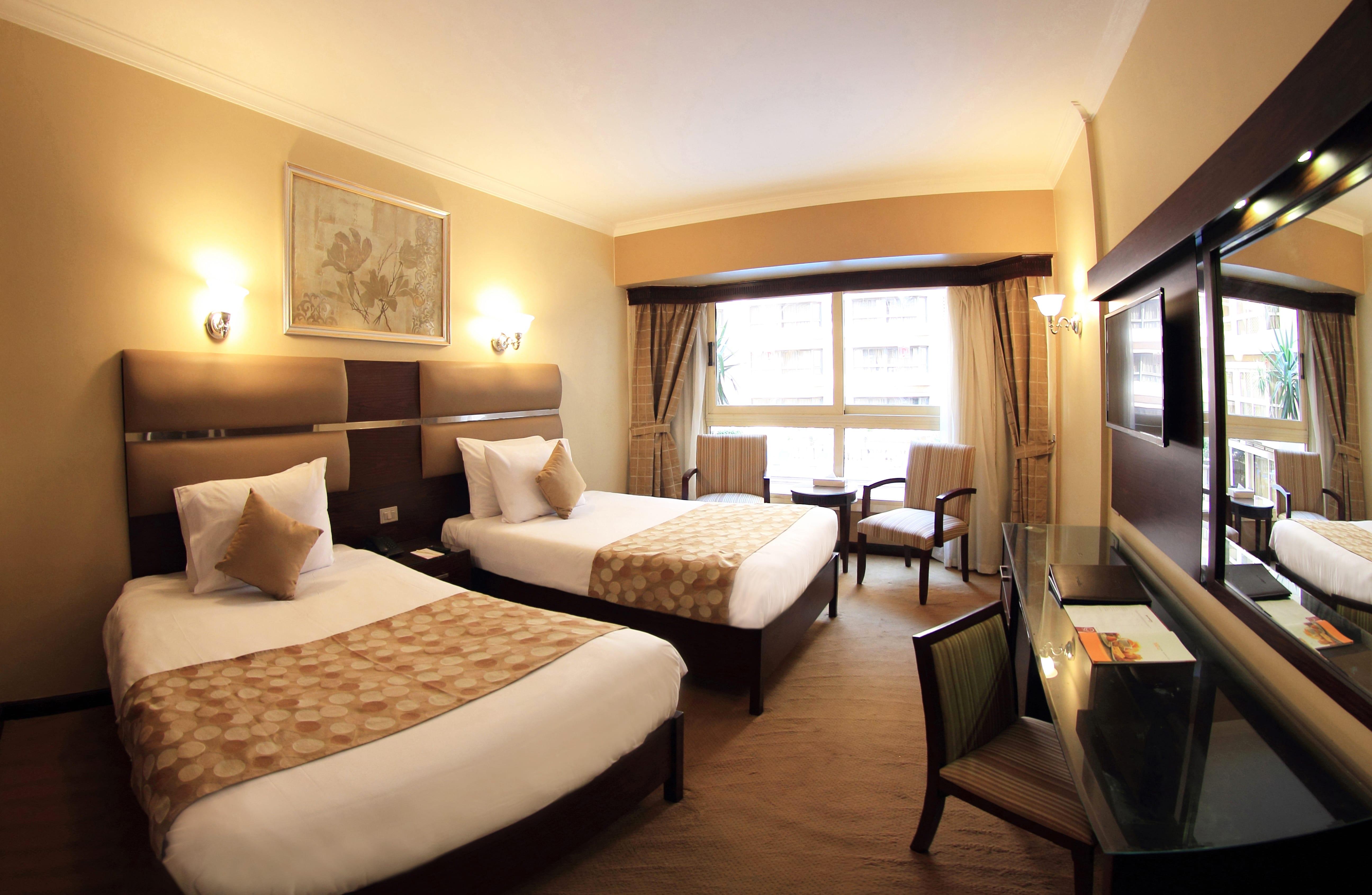 Pyramisa Suites Hotel Cairo Giza Zewnętrze zdjęcie A room at the hotel