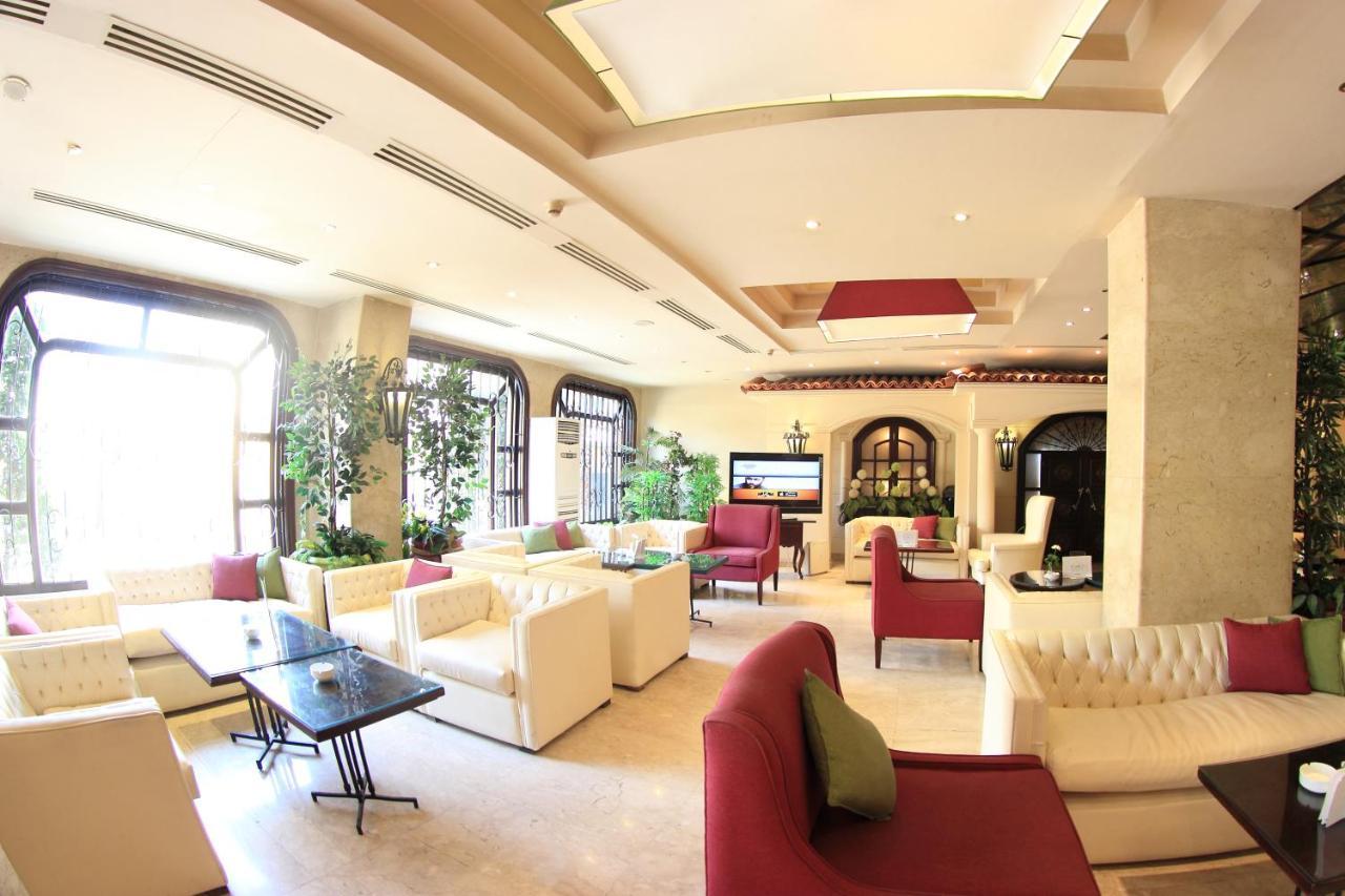 Pyramisa Suites Hotel Cairo Giza Zewnętrze zdjęcie The lounge area
